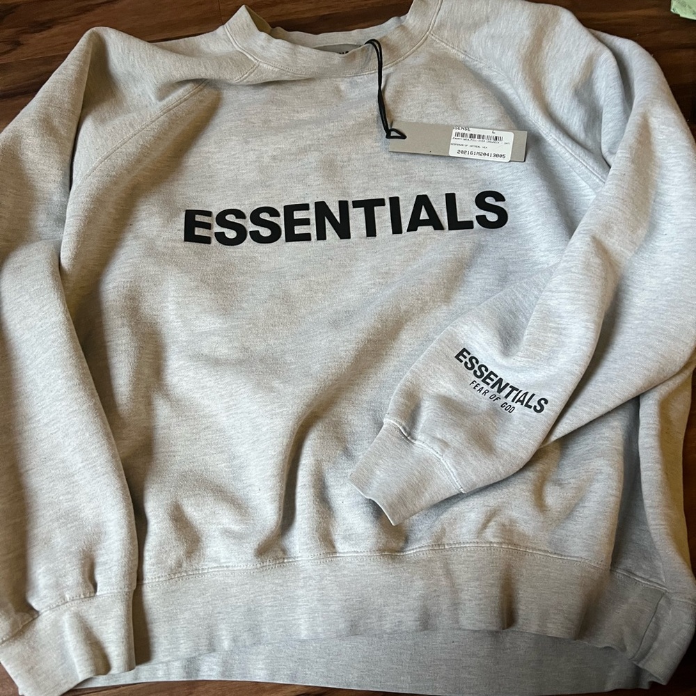 FEAR OF GOD ESSENTIALS
SSENSE Exclusive Oatmeal Pullover Sweater